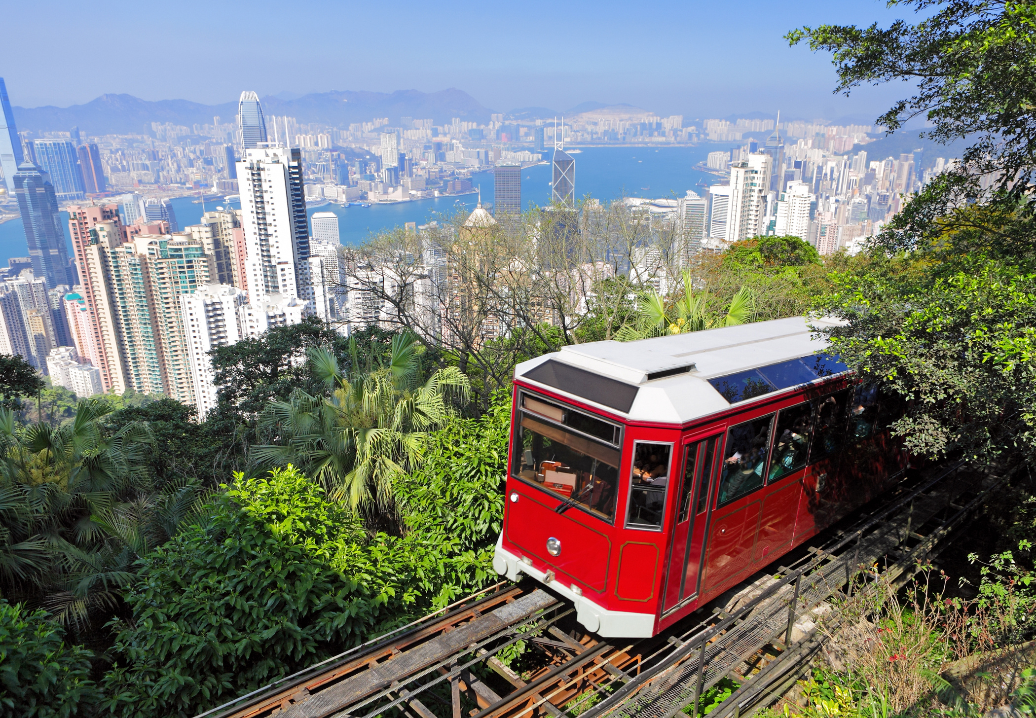 Hong Kong harbour and skyline viewed from Victoria Peak with the Peak Tram in the foreground